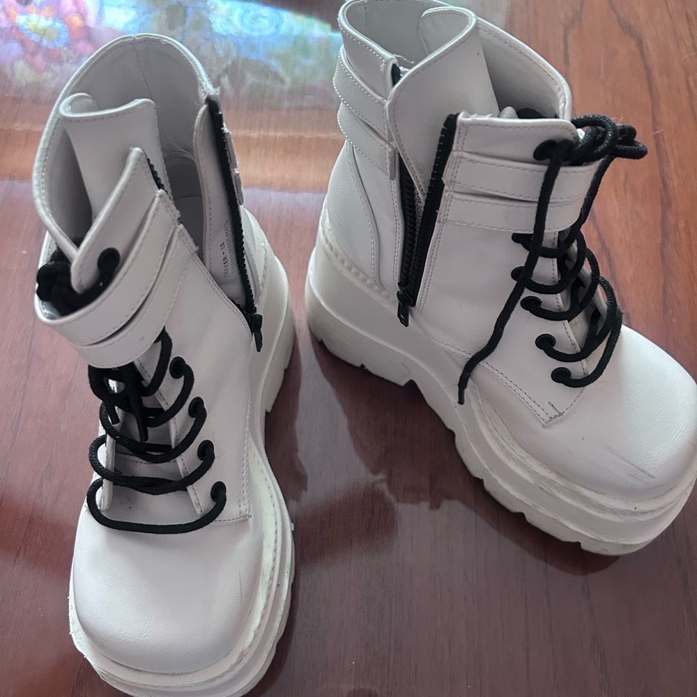 Demonia Shaker-52 platform White Combat Ankle Boots with Black Laces.